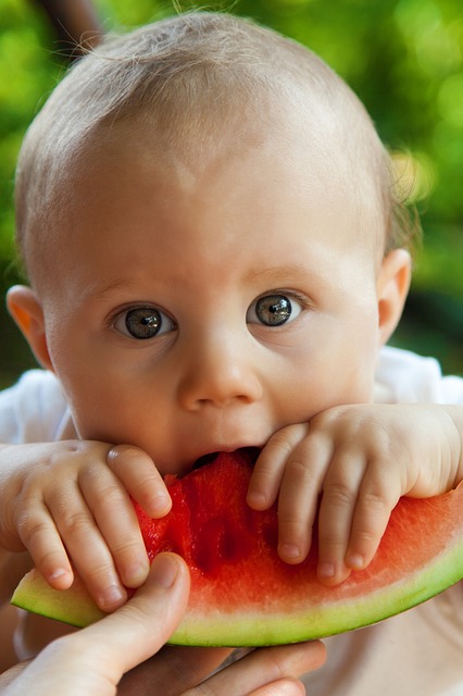 Watermelon tastes better with two hands.