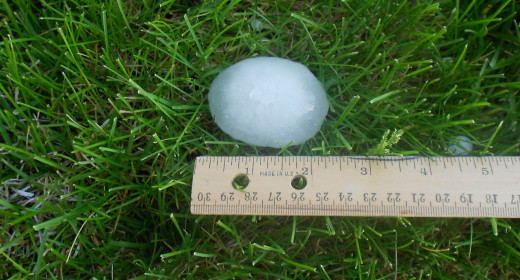 Sometimes during a thunderstorm, hail can form.  This is a hailstone measuring about five centimeters (two inches).