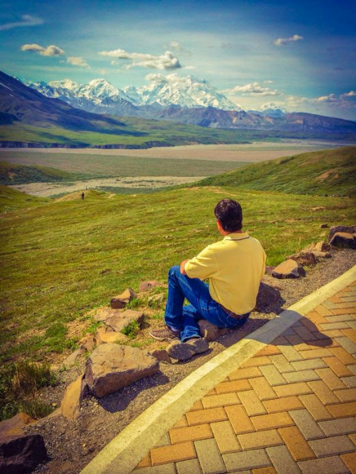 The temptation to wander over the summer tundra to explore the great snowy monolith is nearly irresistible.