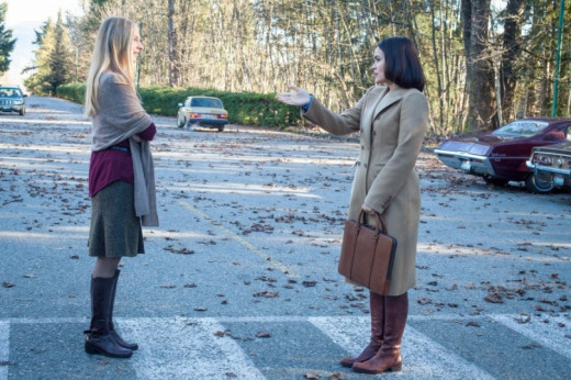 Amy Fischer stops Theresa Burke from entering the school