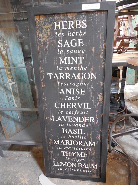rustic black poster of various spices - herbs such as sage, mint, tarragon, etc.. rustic black poster of various spices - herbs such as sage, mint, tarragon, etc..