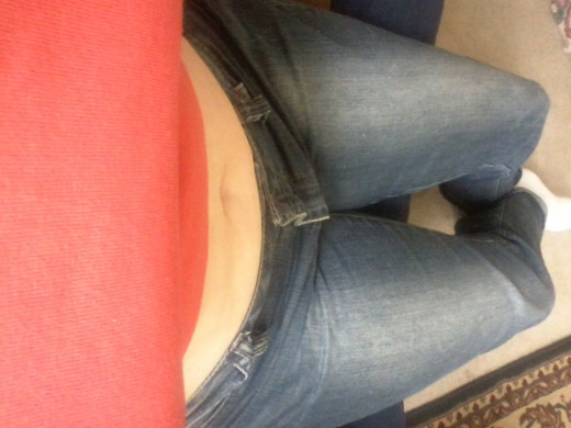 After losing 36 pounds, my belly is significantly smaller.  It looks smaller even when I'm sitting down.