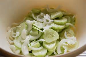 Slice cucumbers and onions