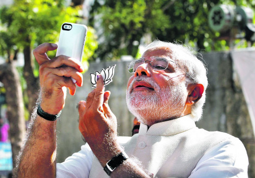 Modi Flaunting BJP’s Symbol