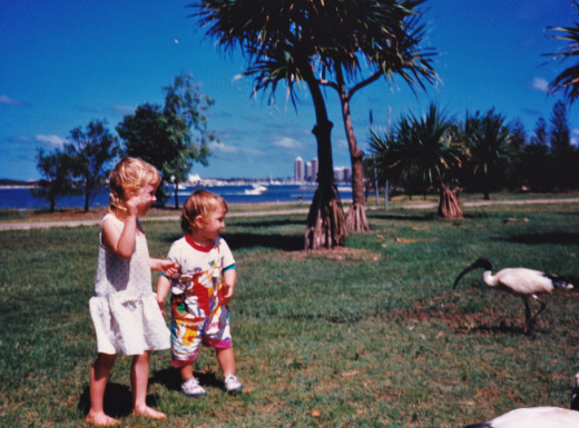 Two Grandchildren on the Gold Coast, Qld. (Pandanus Trees in the Background)