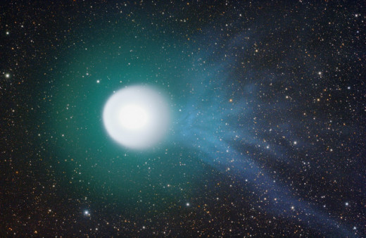 Holmes comet and its blue tail