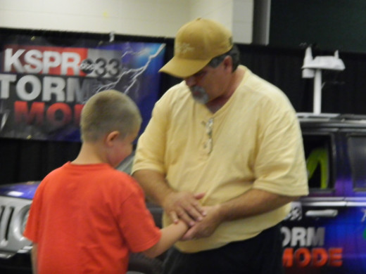 Caleb and I as I thank him for his lucky wristband.