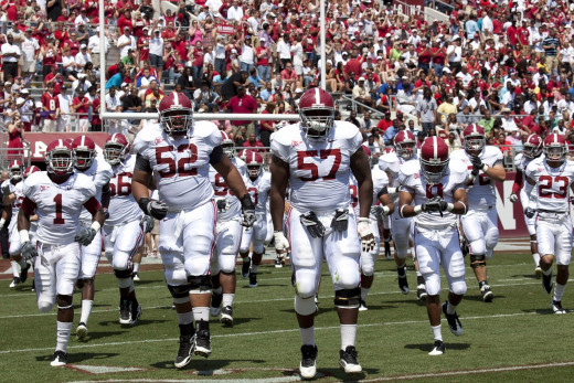 A University of Alabama team prepare to play football.