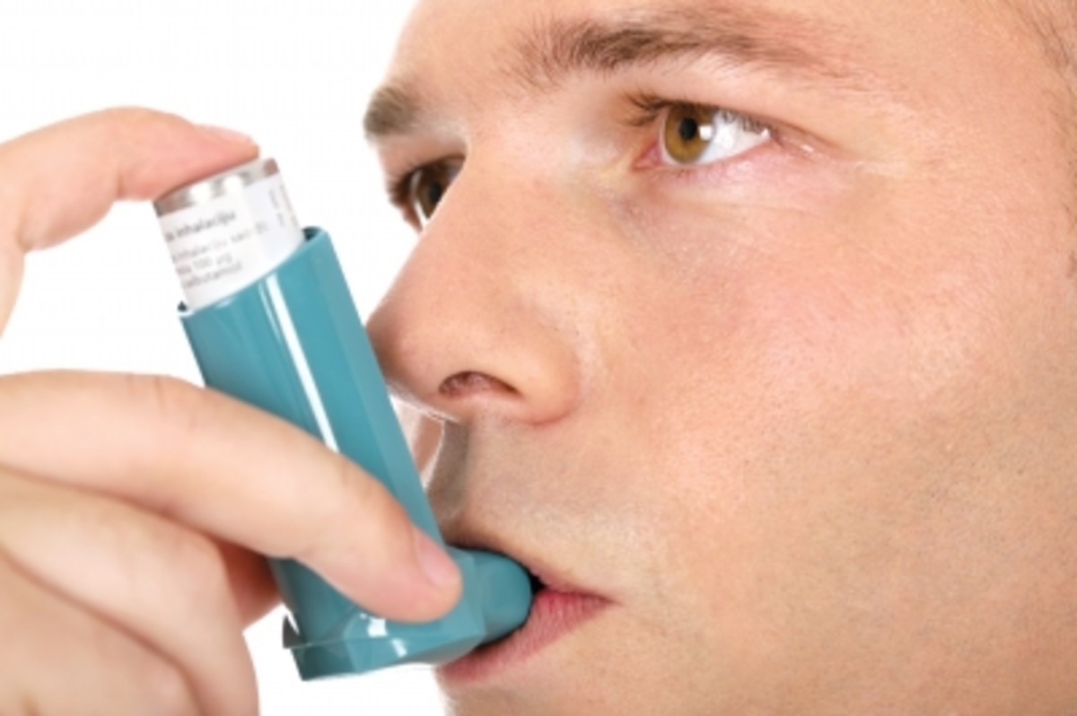 Man using a rescue inhaler. There are times when a rescue inhaler is not sufficient to calm an unexpected asthma attack. Having a quality portable  battery powered nebulizer with you could save your life.