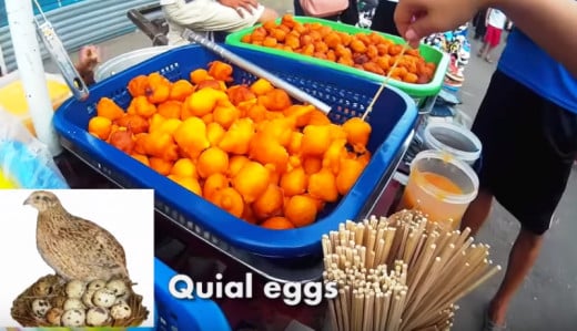 A screenshot of a typical street food scene in the Philippines, specifically in the Queen City of the South, Cebu City. You'll see vendors selling freshly fried quail eggs complete with sweet and spicy or sweet and sour sauce and barbecue stick. 