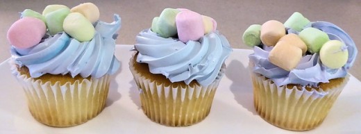 The good thing about white frosting is that you can make it any color and decorate it any way you want.