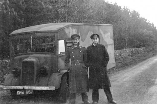 Montagu with Flt. Lt Charles Cholmondeley ('pronounced 'Chumley'  he would tell everyone) beside the van that took them and 'Major Martin'  to Scotland.