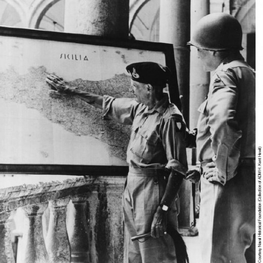 General Montgomery ('Monty') goes over the planned invasion with General Patton - the pair were often at loggerheads, and through Patton's bull-headedness whole German divisions escaped across the Straits of Messina