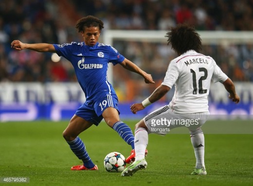 Sané is challenged by Marcelo during the epic match against Real Madrid