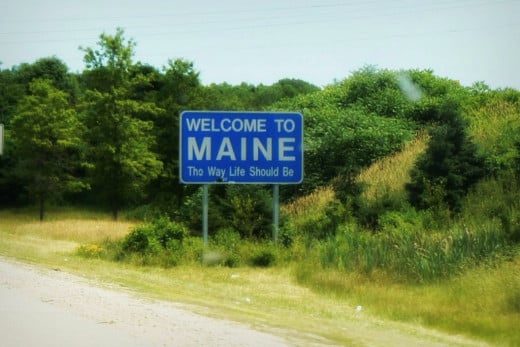 A photo of the Maine State line welcome sign taken in 2010 I believe.