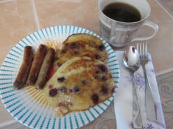 Fresh Banana and Blueberry Pancakes Topped with Vanilla, Cinnamon Butter