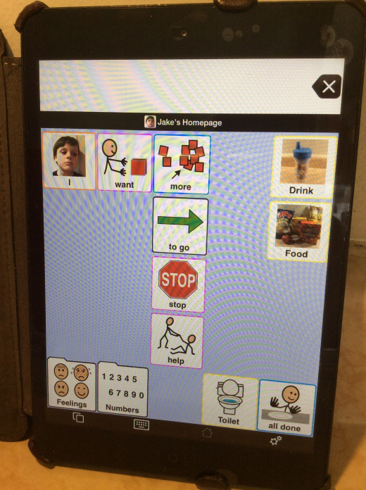 Here is Jake's very simple Proloquo2Go page on his iPad Mini, including symbols and photos.
