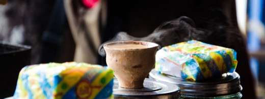 Tea served in baked clay cups