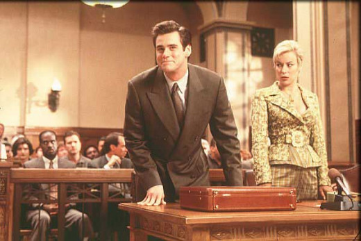 Samantha Cole (Jennifer Tilly) watches Fletcher make a fool of himself in court. 