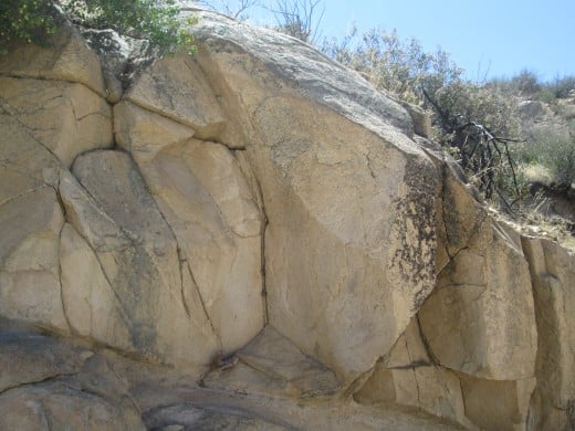 Lines are visible in the granite boulders.