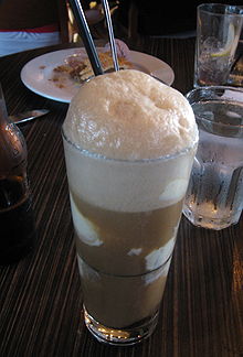 Root beer brown - or black - cow or purple cow - vanilla ice cream in grape soda
