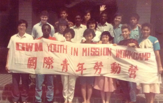 Group of Young people representing various parts of the world such as Malaysia, Singapore, Jamaica, India, Cayman Islands, The United Kingdom, Fiji, Malawi (Africa), Taiwan.