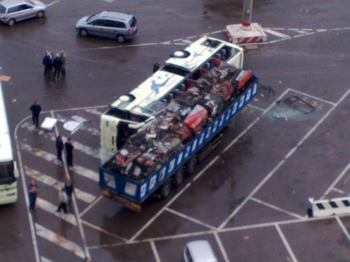 Coach on its side having been knocked over