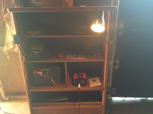 Do you have an old wall unit hanging around you don't want or know what to do with? Turn it into a power box...I have updated the inverter to 1000 watts in this photo and you  can see the charge regulator mounted on the frame of the power box itself.