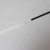 One strip of white quilling paper and half a strip of black paper joined together. One strip of white quilling paper and half a strip of black paper joined together.