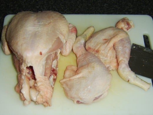 Whole leg portions and parson's nose are cut from chicken