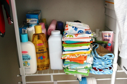 Baby supplies include washcloths, baby shampoo, baby oil, baby sunscreen, diaper cream.