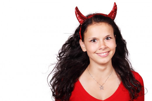 For a devil costume all you need is a red dress and a pair of horns and you are all set.