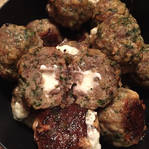These mozzarella-stuffed meatballs almost look too good to eat.