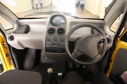  Tata Nano dashboard is very simple. CD player and radio on this deluxe model