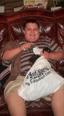 Zachary enjoying shopping between potential outbursts. Kids with Autism can still lead fully functional lives.