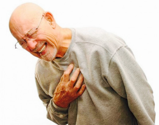 Man reacting to the Excruciating Pain in Chest Region.