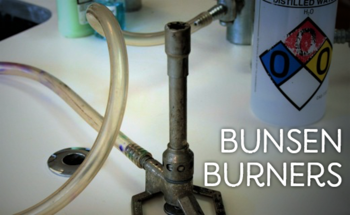 An unlit bunsen burner connected to a gas source