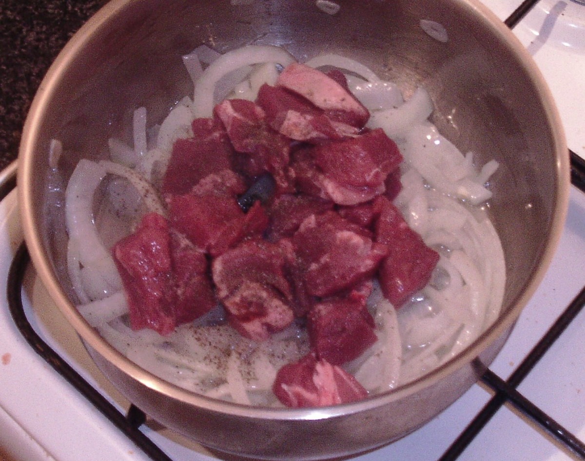 Diced Lamb added to onion and garlic