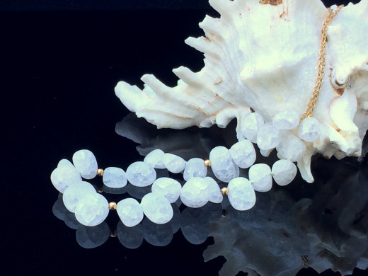 Luminous, white frosted crackle quartz.  Courtesy Naiad Necklaces.