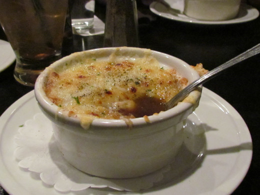 French onion soup was served as an appetizer before dinner.