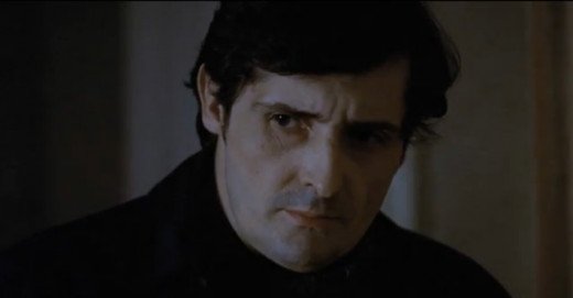 Father Karras played by Jason Miller in "The Exorcist"