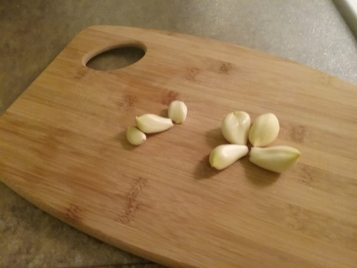 Peel at least 4 large cloves of garlic or a bit more if you are a garlic lover like I am.