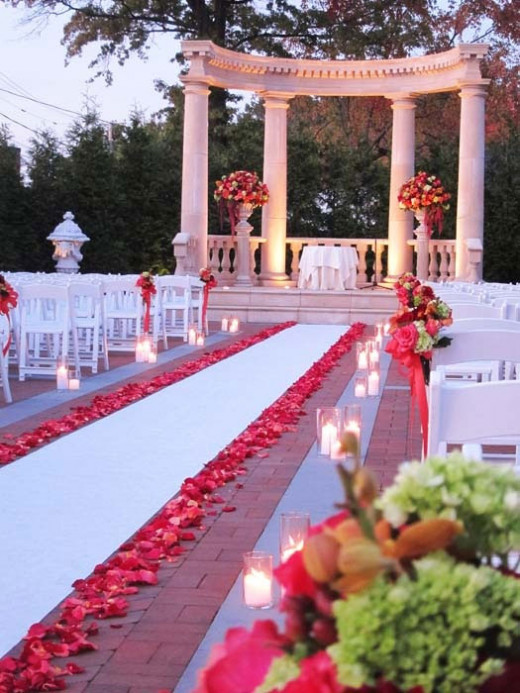 Set the mood of love and romance with rose petals on your aisle runner.