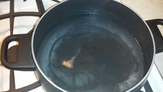 Place Water and baking soda in a large sauce pan and bring to a boil