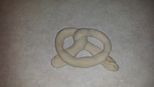 And then fold the Loop end of the "U" down over the twist to form the traditional pretzel shape