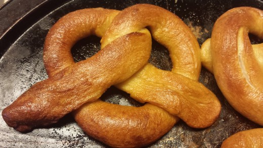 Now that your house is filled with the heavenly aroma of fresh baked soft pretzels, Sit down and enjoy.