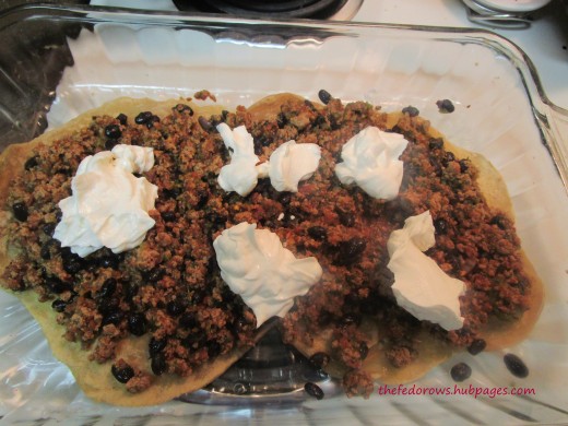 Add dollops of sour cream. 
