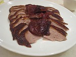 The color of the roast duck is red - this is a good luck color - so duck is communally served at weddings and functions that symbolize good fortune. 