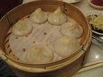Chinese dumplings - A common dish served at Chinese new year. Dumplings represent good fortune.