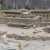 As you walk through the lower area of the ruins, you see the royal bathing area. It was filled with amazing stone water-works. You can see the water temple as well.
